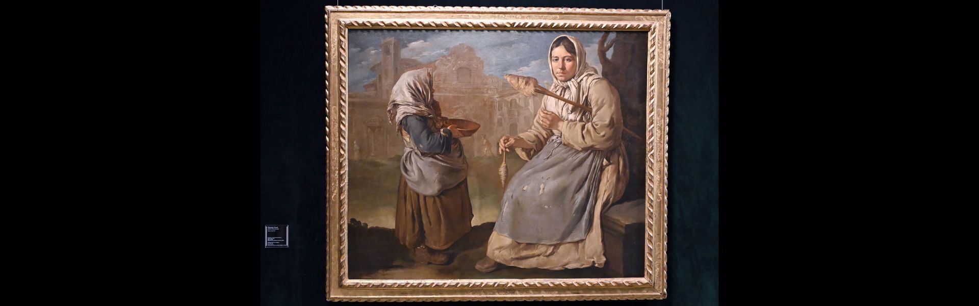 Filatrice e piccola mendicante